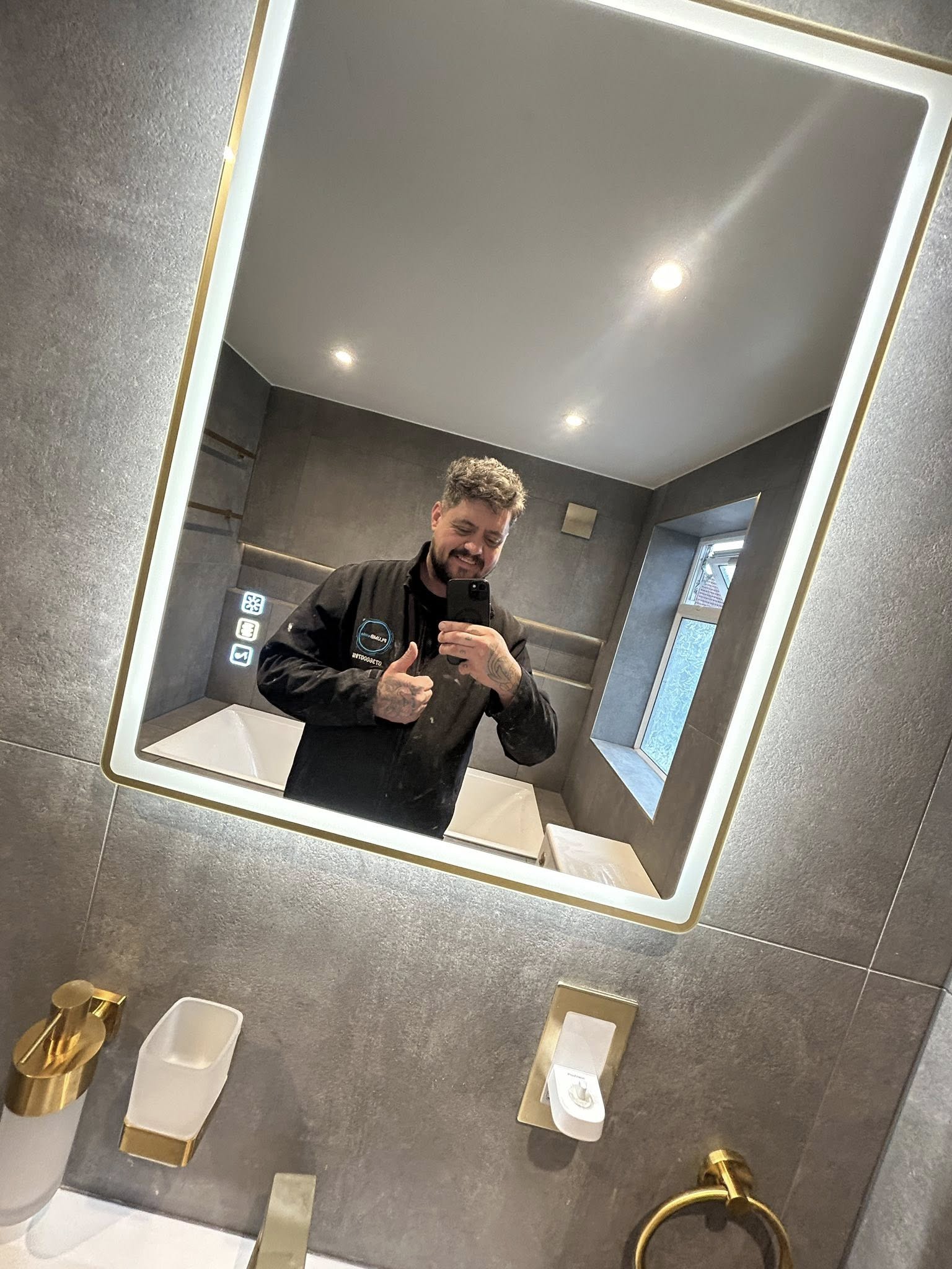 Monochrome black wetroom with floating vanity